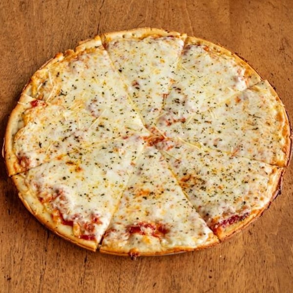 A whole cheese pizza from Little Pizza Paradise, cut into slices, on a wooden surface.