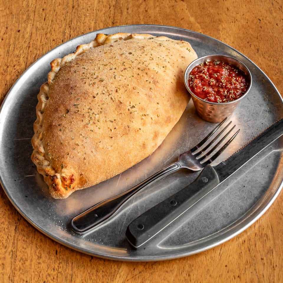 Savor Our Calzone Today